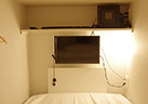 Mixed dormitory - room with television and computer images